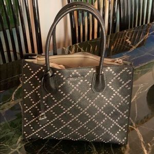 SOLD.  New Michael Kors Grommet Black leather